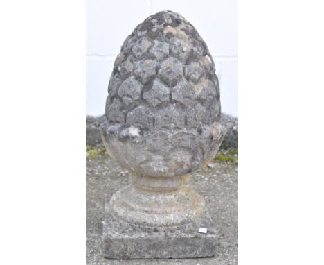 A stone pineapple finial, 52cm high