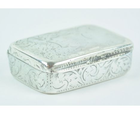 A silver snuff box of rectangular form,with scroll engraved sides and lid, Birmingham 1800, 1.5cm x 5 cm x 3cm, 30 grams