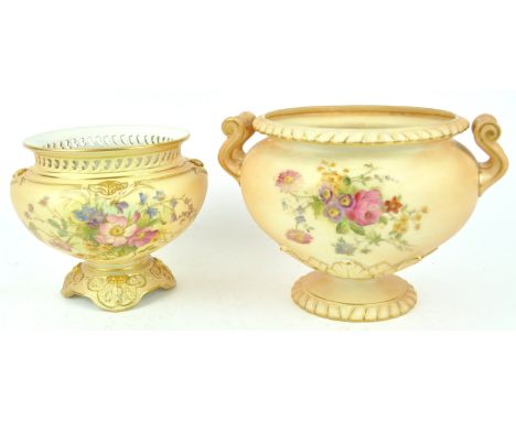 A Royal Worcester blush ivory baluster two handled planter, decorated with a floral spray, 15.5cm high, together with another