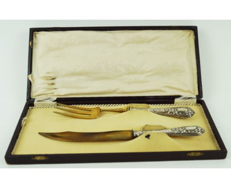 A Sclingen gilded serving knife and fork, with embossed white metal handle, boxed