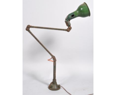Mek-E-Lek - An early 20th Century vintage industrial workmans mechanist articulated lamp having four sections with a green po
