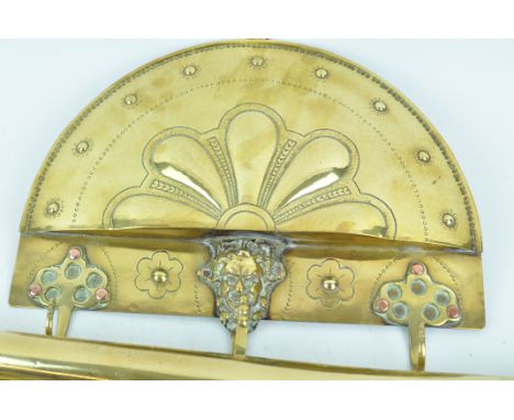 A set of three brass mounted hooks for kitchen tools, 24cm high x 29cm wide