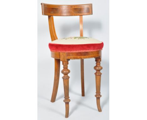 A Victorian mahogany cellists chair, with round tapestry seat on turned tapering legs, the seat 40cm diameter