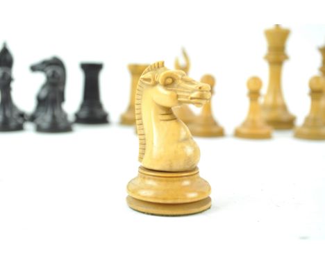 A Staunton chess set, with retailers Crown marks for Jacques &amp; Son, height of King 10.5cm, together with a pine box with 