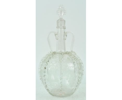 A late 19th century Dutch glass decanter, the spherical body decorated with etched panels of fruit, ships and windmills, 30cm