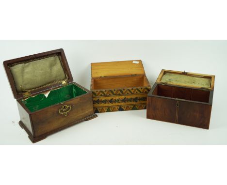 A Scandinavian painted wooden tea caddy, of rectangular section with hinged cover, painted with triangular bands and laurel, 