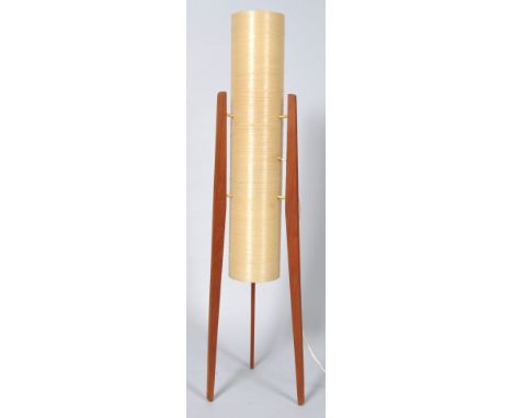 A 1970's floor standing rocket lamp, with spun fibre glass shade enclosing double bulb holders, with three flared teak legs, 