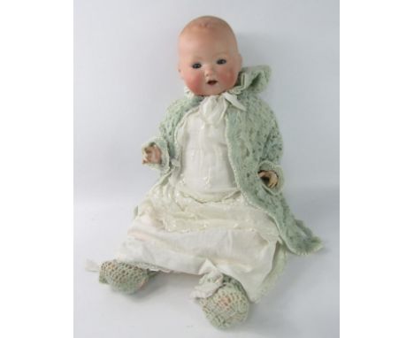 An Armand Marseilles bisque head doll, 351/5K.