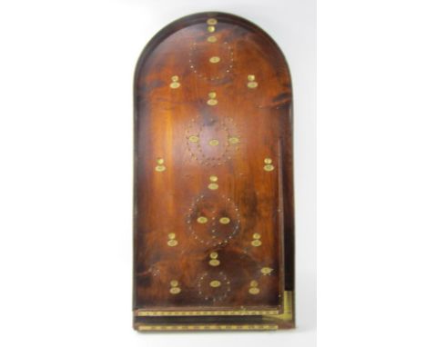 A Bagatelle board.