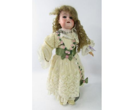 An Armand Marseilles Thorodora bisque head doll, A11/2M.