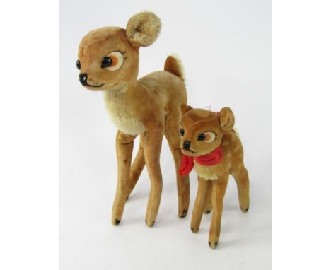 A Steiff Bambi Bear, button lacking, 21cm high, and a smaller Bambi, 14.5cm high.