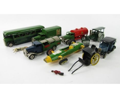 A Tri-ang Minic Toys tinplate motor coach for Greenline, a Minic tinplate Southern Railway van, dustbin lorries, steam roller