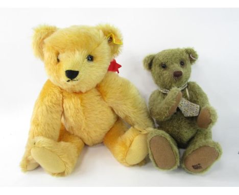 A Steiff olive green Tramp teddy bear, limited edition 1500, with certificate, together with a replica igog bear. (2)