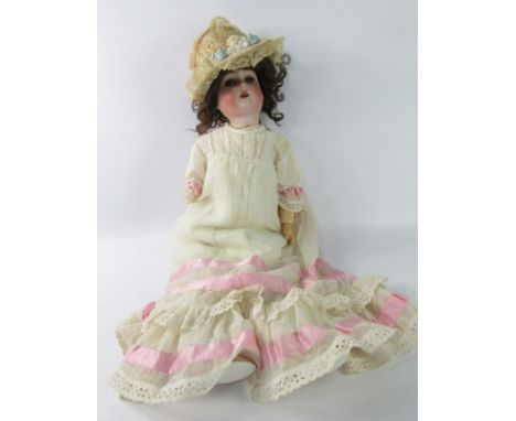 An F & W Goebel bisque head doll, 120, 7.5cm.