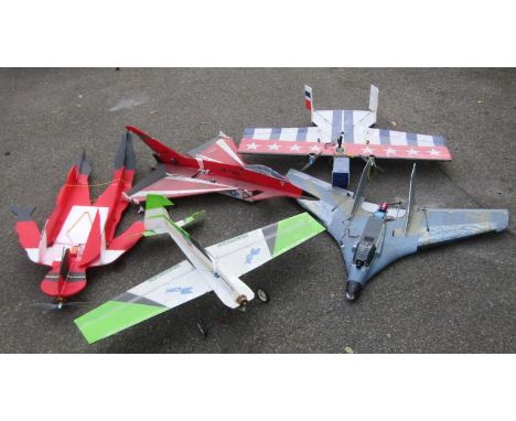 Foam and composite starter R/C planes, including Multiplex 3DX, Swift II, F14 Torment, a flying Santa Claus, etc. (5)