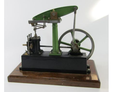 A Stuart live steam model beam engine, in green and black livery, on a pine wood plinth, 31cm high overall.