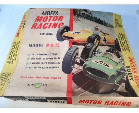 An Airfix motor racing MR15 model set, complete with track, electric car, lap recorder track section, etc, part boxed, 10cm h