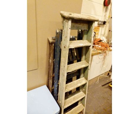 Three sets of wooden step ladders 