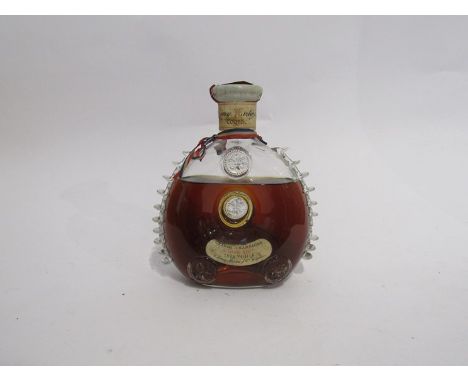 Remy Martin Louis XIII Cognac Tres Vieille, in Baccarat crystal decanter circa 1962-63, evaporation present, one glass nodule