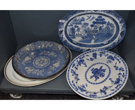 A selection of large ceramic plates and chargers including wash bowl and similar