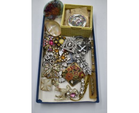 A selection of vintage costume brooches including diamante, nautical, mother of pearl, Coalport etc