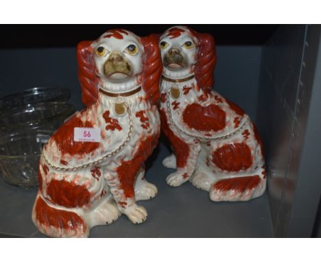 A pair of antique Staffordshire flatback figures of spaniels
Condition report - No restorations found, crack to one leg, slig