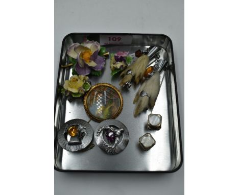 a small selection of brooches including Scottish interest and ceramic