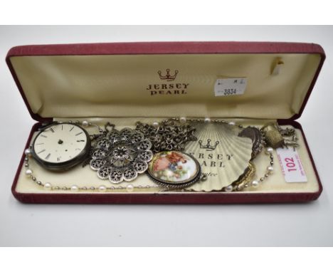 A small selection of costume jewellery including an HM silver pocket watch (AF), white metal charms, brooch, pendant and a Je