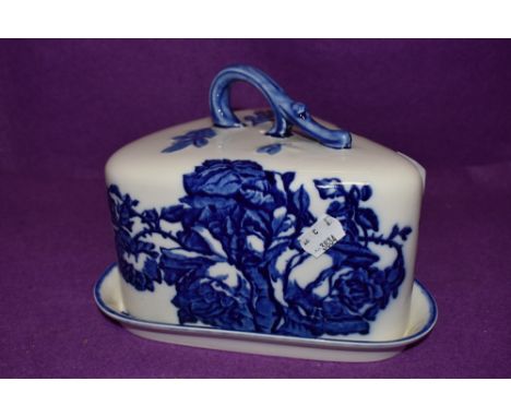 A ceramic cheese dome by Blakeney with blue and white transfer design base and cover both good condition