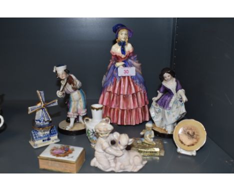 A selection of figures and figurines including pair of hard paste musicians