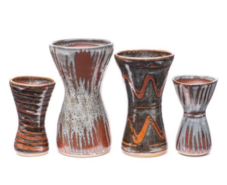 *John Leach [1939-2021] Muchelney Pottery four stoneware vases: each of waisted form under wood ash over tenmoku glazes and w