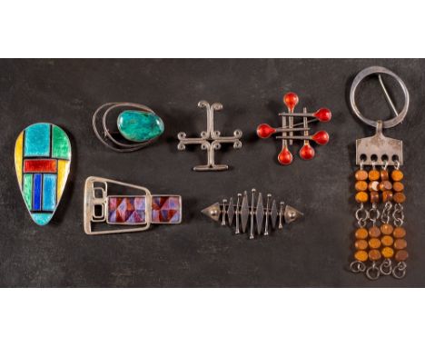 A collection of mid 20th century modern brooches,: including Gordon William Stevens, a silver fish brooch, with hallmarks for