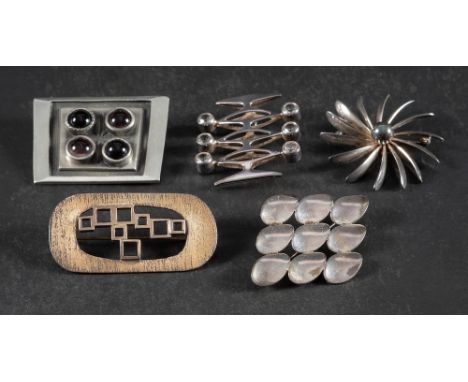 Five modernist brooches,: including a silver and synthetic white spinel Kultasepät Salovaara, Turku, Finland, 1973; two brooc