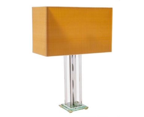 A glass table lamp, modern,: the rectangular pleated card shade and fitment on a square glass platform, on eight vertical rod