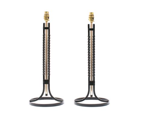 A pair of Robert Welch designed wrought iron table lamps: wisteel central rod flanked by wrought iron spiral twist columns on