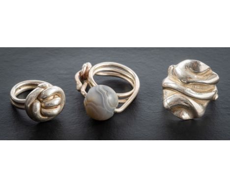 Helen Fieler, three silver rings, one with a banded agate bead,: with Sheffield hallmarks, 1998-9, length of ring heads ca. 2