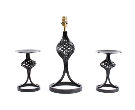 A Robert Welch designed wrought iron table lamp: 39cm high, with two matching wrought iron "Fancy cage" candle stands 21cm hi