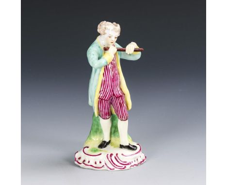 Flötenspieler. Limbach. Ungemarkt, 2. H. 18. Jh.             Polychrom bemalt. H 12,5 cm.             Auf einem Rocaillesocke