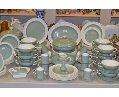 A comprehensive green glazed Wedgwood dinner service comprising of sauce boats and stands,  tureen and cover, soup bowls, cof