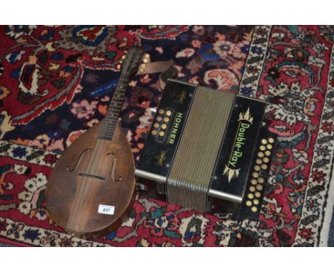 Musical Instruments - a Hohner Double Ray accordion;   a Petro accordion, cased;  an American mandolin (3)