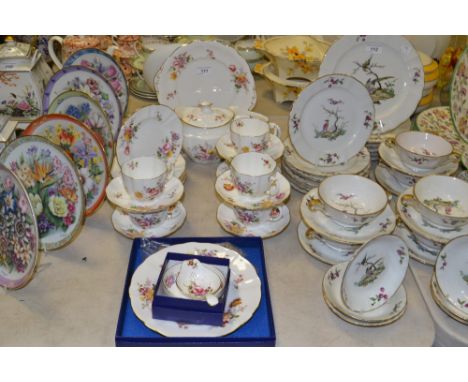 A Royal Crown Derby posies teapot,, sugar bowl, cream jug, strainer, cups and saucers, tea plates, bread and butter plate