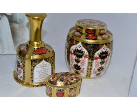 A Royal Crown Derby 1128 pattern ginger jar and cover; a Royal Crown Derby 1128 pattern commemorative bell; an 1128 pattern o