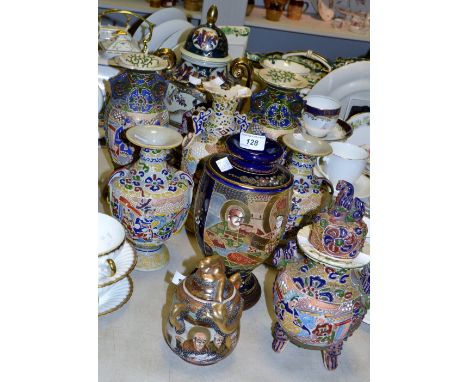 A pair of Satsuma vases decorated in tones of blue; another smaller pair; a twin handled jar and cover; etc; quantity