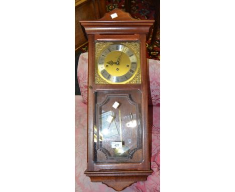 A 20th Century Metamec wall clock with Roman numeral dial