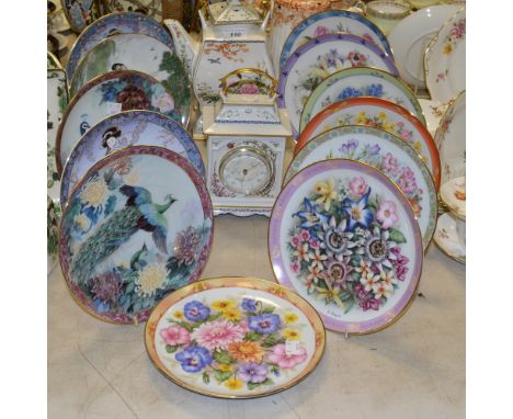 A Franklin Mint Orientalist tea kettle on stand;  a similar mantel clock;  a set of seven Danbury Mint Bouquets of the World;