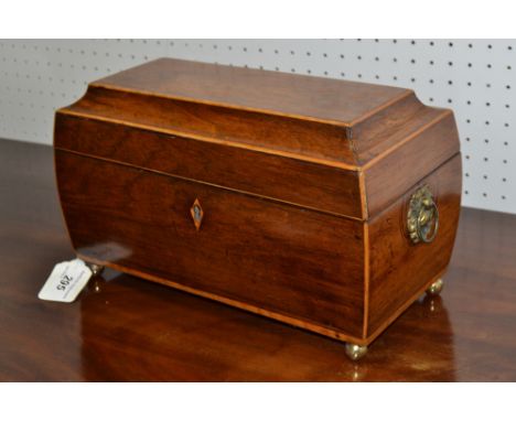 A walnut sarcophagus shaped tea caddy 