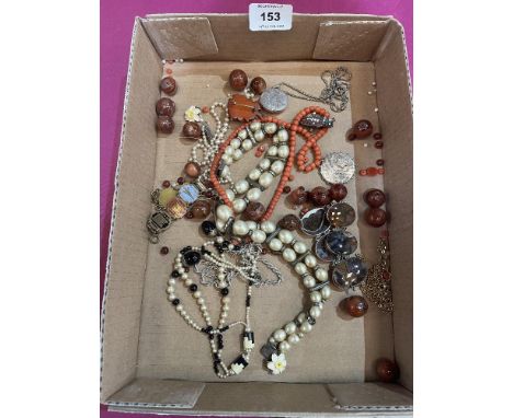A collection of vintage jewellery and beads, the lot to include a silver Victorian 1887 Jubilee  brooch and a silver locket a