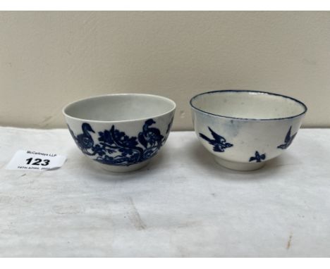 A near pair of Worcester tea bowls. Birds in Branches pattern. c. 1770. One with crack (firing?) to base.