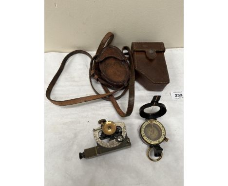 A small brass sextant by E.R. Watts, London and a WWI military marching compass. Both leather cased 