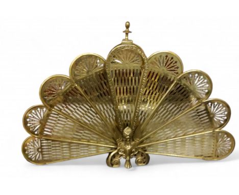 A 20th century brass peacock folding fire screen, 94cm wide 